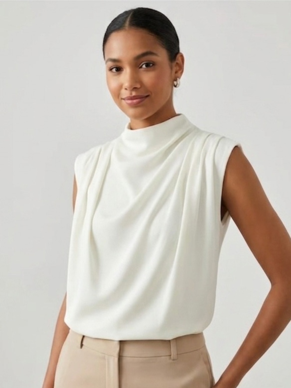 Elegant White Sleeveless High-Neck Blouse